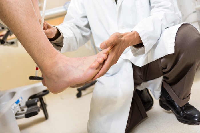 Doctor treating a sports injury