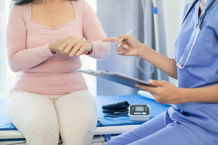 Doctor treating nerve pain