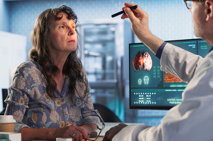 Doctor performing a concussion test on a patient
